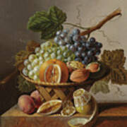 Grapes, An Orange And Walnuts In A Wicker Basket With A Lemon And Plums, All On A Marble Ledge Art Print