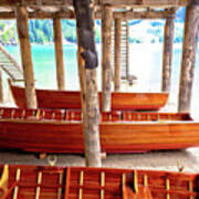 Wooden Boats Under Boat House On Braies Lake Art Print