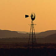 A Desert Windmill At Sunset #1 Art Print