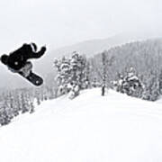A Man On A Snowboard Flies Through The Art Print
