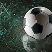 A Soccer Ball On Broken Glass Art Print