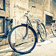Bicycle Leaning Against Wall Art Print