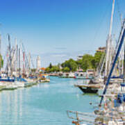 Boats Moored In Harbor Channel Art Print