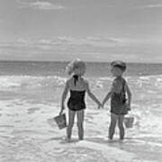 Boy And Girl Standing On Beach, Holding Art Print