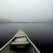 Canoe On A Misty Lake Art Print