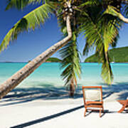 Chairs Under Palm Trees At A Beach In Art Print