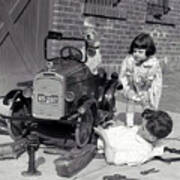 Children And Dog Repairing 1920s Pedal Car Art Print