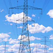 Cloudy Sky Over Electricity Pylons In Art Print