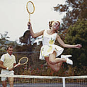 Couple On Tennis Court, Woman Jumping Art Print