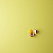 Cracked Egg On Yellow Background Art Print