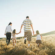 Family Walking Together In Rural Field Art Print