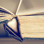 Heart In The Sleeve Of A Book Art Print