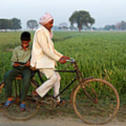 Indian Father Cycling Son To School Art Print