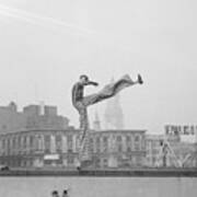 Joseph De Vigilio On Stilts On Rooftop Art Print