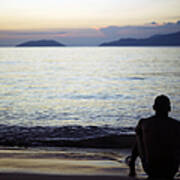 Man Sitting Alone On A Beach Art Print