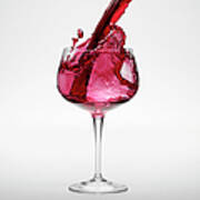 Red Wine Being Poured Into Wineglass Art Print