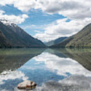 Mountain And Clouds Reflections On The Mirror Surface Of Lake Gunn In New Zealand Art Print