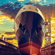 Ship In Dry Dock At Sunrise - Shipyard Art Print