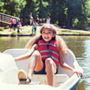 Smiling Girl Sitting In Pedal Boat On Sunny Day Art Print