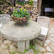 Stone Table With Flowers And Chairs In A Garden Photograph By Stefan Rotter