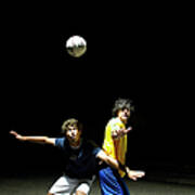 Two Soccer Players Heading Ball, Night Art Print