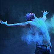 Young Man In Spray Of Colored Powder Art Print