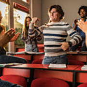 Young Students Applauding Their Friend In The Classroom. #1 Art Print