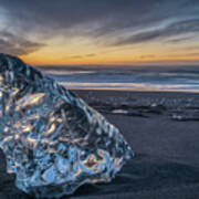 A Big Block Of Ice On The Beach At Sunrise, Near The Jokulsarlon Lagoon In South Iceland, Also Calle Art Print