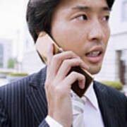 A Business Man Talking On Cell Phone Art Print
