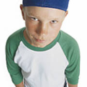 A Caucasian Male Preteen In A Green And White Shirt And Blue Cap Holds His Mitt And Smirks Looking Up Towards The Camera Art Print