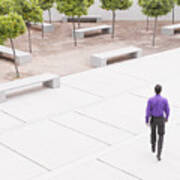 Businessman Walking In Modern Courtyard Art Print
