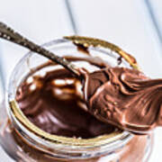 Chocolate Spread In Spoon. A Jar Of Hazelnut Chocolate Spread Art Print