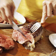 Close-up Of Cooked Meat Being Cut. Art Print