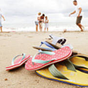 Family On Beach, Flip-flops In Foreground Art Print