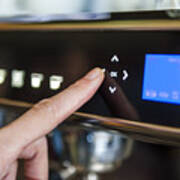 Finger Pushing Digital Button On Coffee Machine Art Print