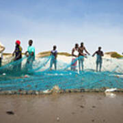 Fishermen Pulling The Net At The Beach. Art Print