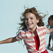 Girl Running With Arms Out, On Studio Background Art Print