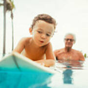 Grandfather Teaching Grandson To Surf Art Print