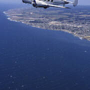 Lockheed 10 Electra Flying Over Coast Art Print