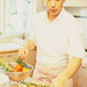 Man In Kitchen Preparing Food Art Print