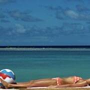Model Lying On The Beach In A Polka Dot Bikini Art Print