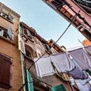 Narrow Alley With Old Houses And Freshly Washed Laundry In The City Of Rovinj In Croatia Art Print