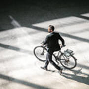 Overhead View On Elegant Businessman Going With Bycicle In City Art Print