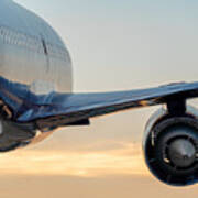 Passenger Airplane Taking Off At Sunset Art Print