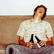 Portrait Of A Young Man Asleep On The Couch After Drinking Too Much Beer Art Print