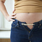 Pregnant Woman Bursting Out Of Jeans Art Print