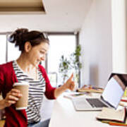 Smiling Woman With Coffee To Go At Desk At Home Art Print