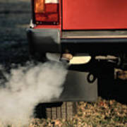 Smoke Coming From Exhaust Pipe Of A Car Art Print