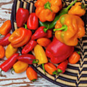 Sweet Peppers Spilling Out Of A Basket Art Print