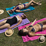 Three Mature Women In Swimwear, Sunbathing On Grass Art Print